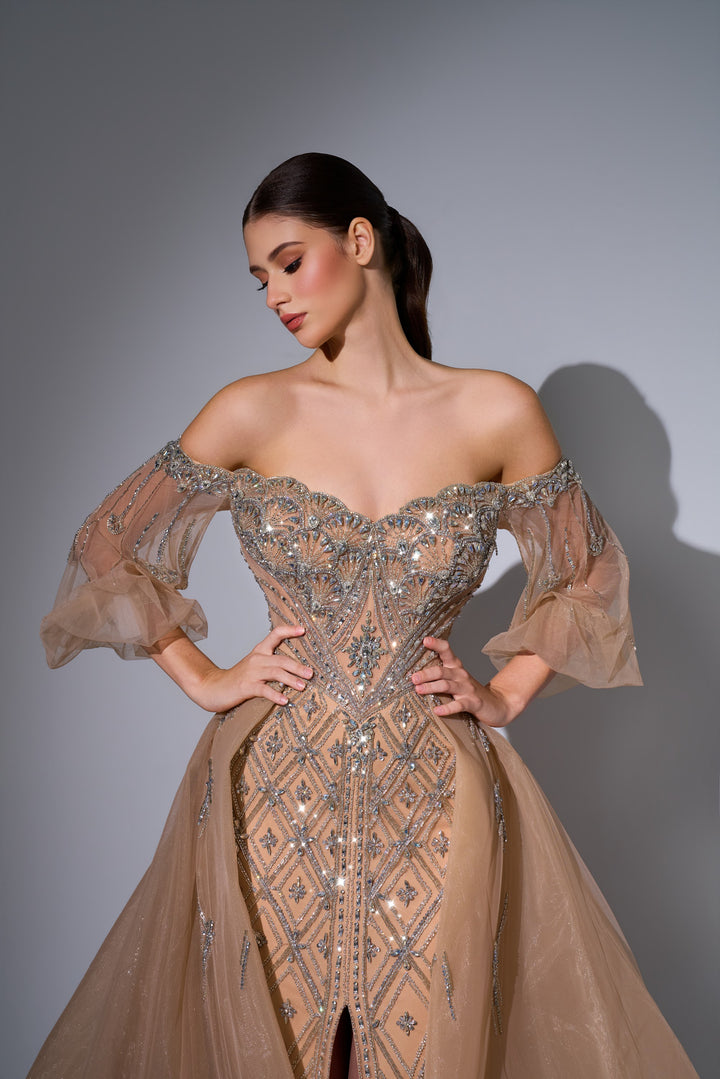 Delilah LD11622 Off-the-Shoulder Puff Sleeve Lattice Beaded Mermaid Gown with Tulle Overskirt - Champagne close-up view