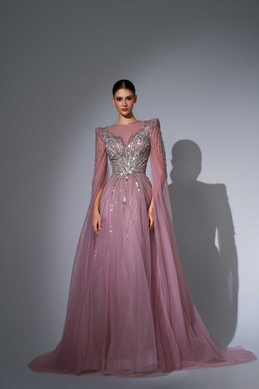 Delilah LD11670 Illusion Neck Long Sleeve Cape Beaded A-Line Gown - Pink front view