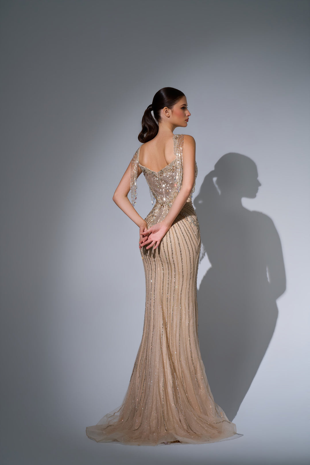 Delilah LD11684 Crystal Fringe Strap Plunging Linear Beaded Mermaid Gown - Champagne back view