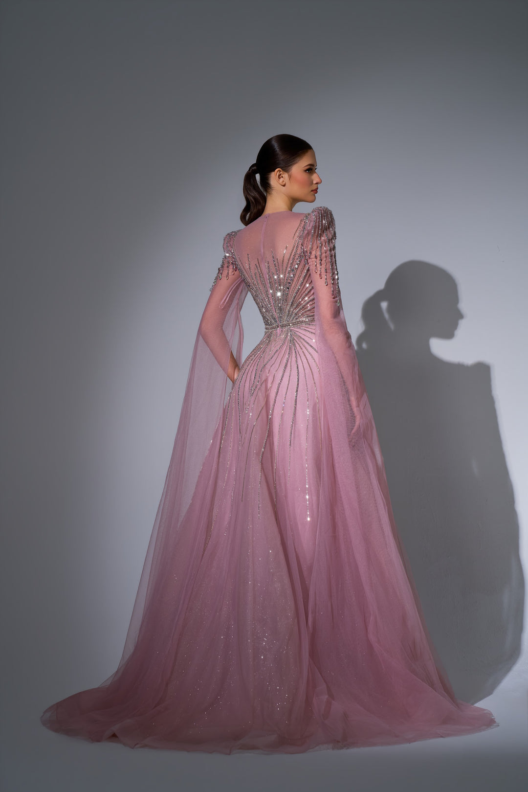 Delilah LD11670 Illusion Neck Long Sleeve Cape Beaded A-Line Gown - Pink back view