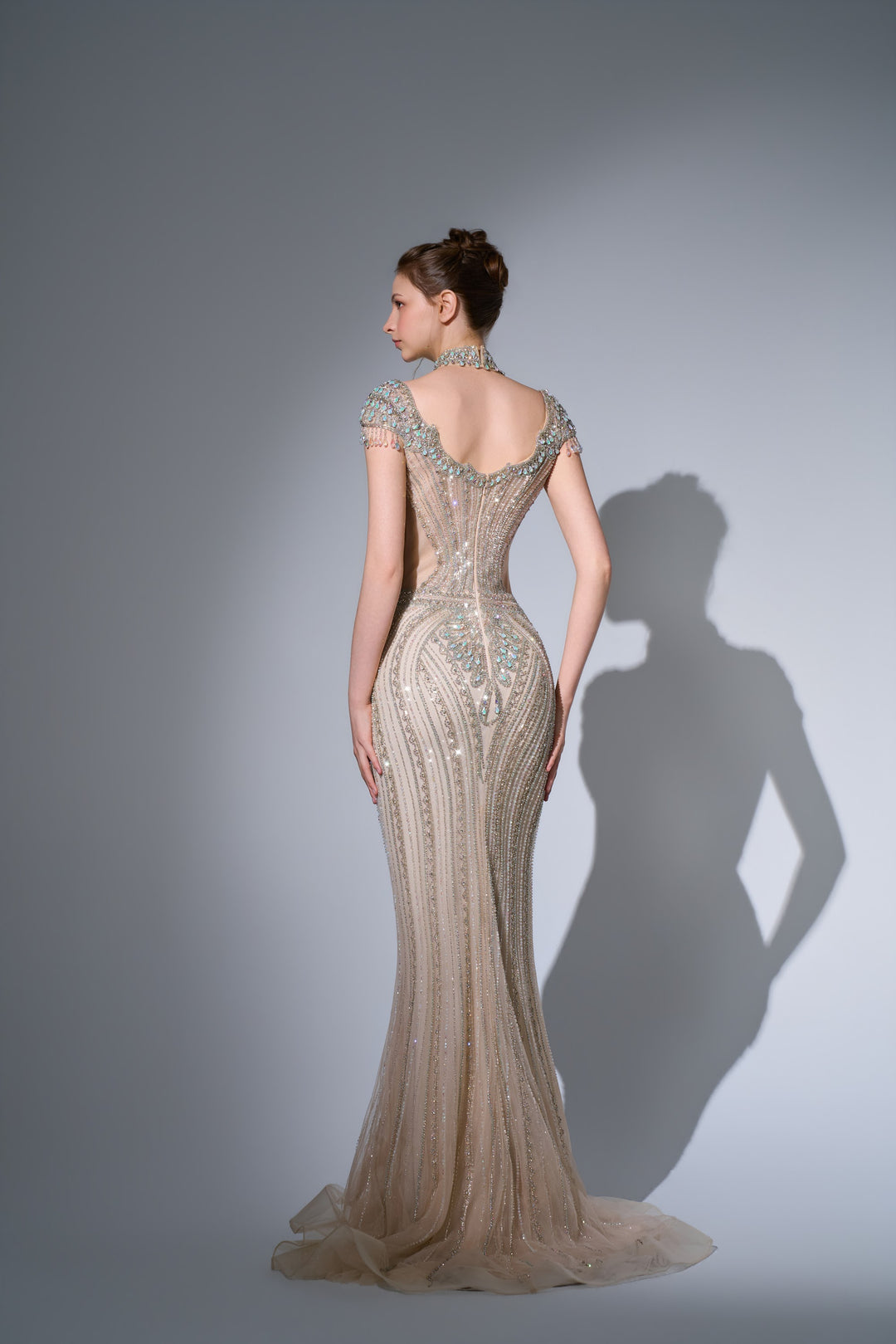 Delilah SH12057 High Neck Cap Sleeve Crystal Mermaid Gown with Ruffled Overskirt - Champagne back view