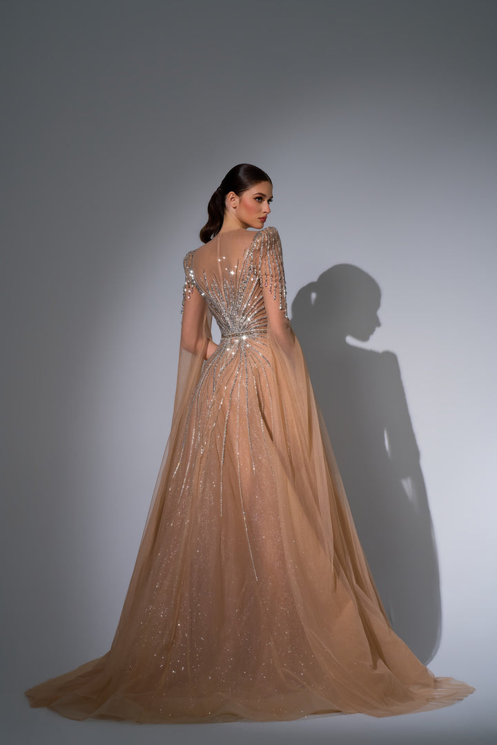 Delilah LD11670 Illusion Neck Long Sleeve Cape Beaded A-Line Gown - Champagne back view