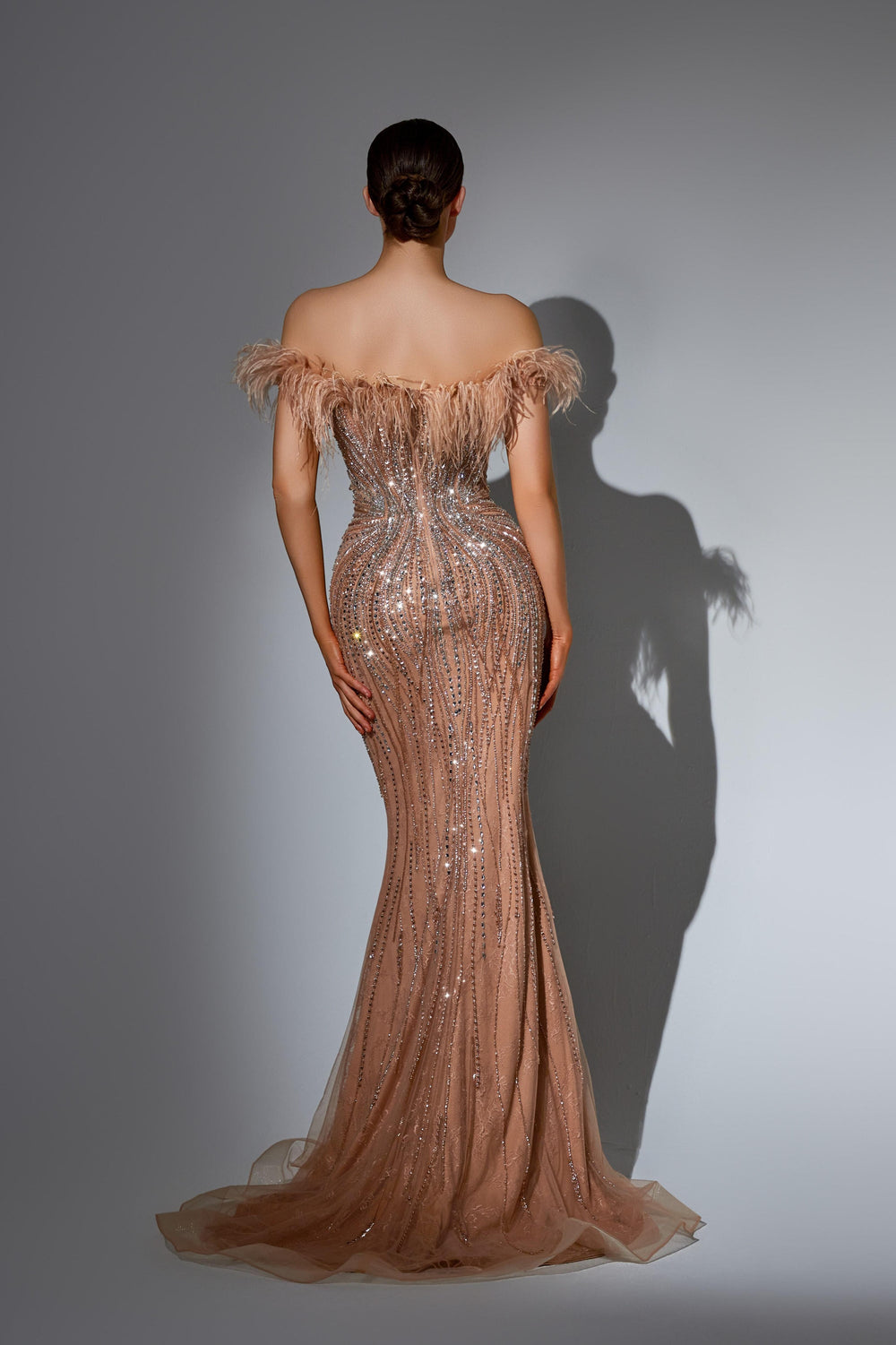 Delilah HM337 Off-the-Shoulder Feather Trim Beaded Mermaid Evening Gown with Slit - Champagne back view