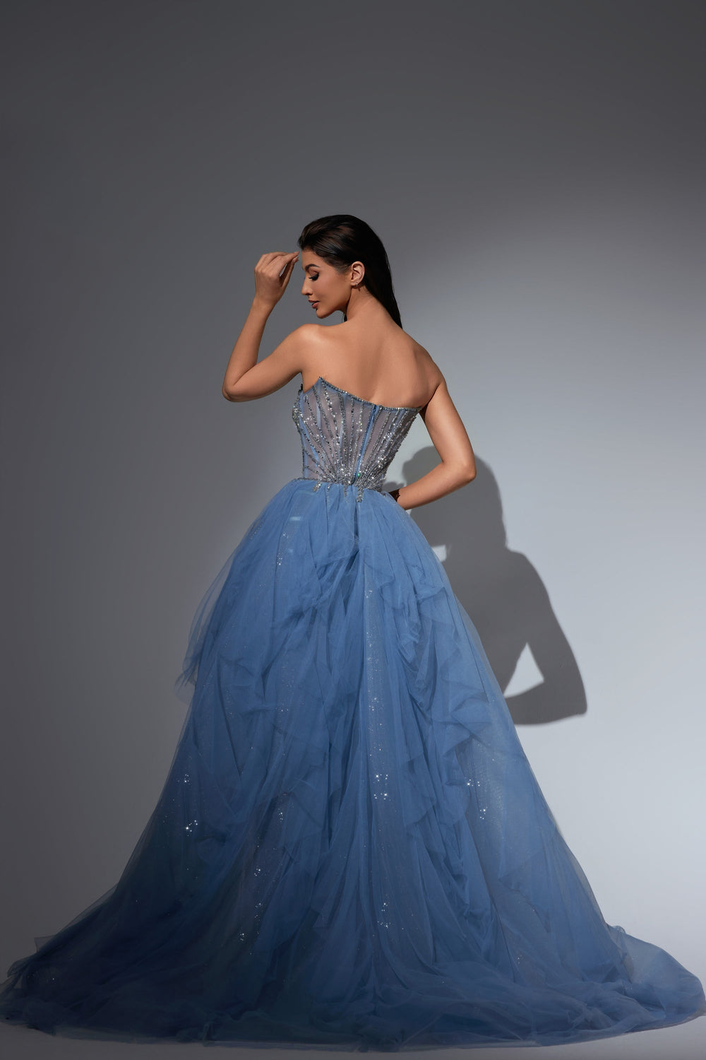 Delilah LD11481 Strapless Sweetheart Beaded Corset Sheath Gown with Ruffled Sparkle Overskirt - G.Blue back view