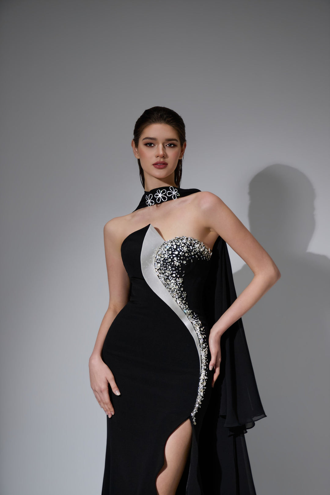 Delilah LD41031 Strapless Sweetheart Column Gown with Crystal Swoosh, Choker Drape and Slit - Black close-up view