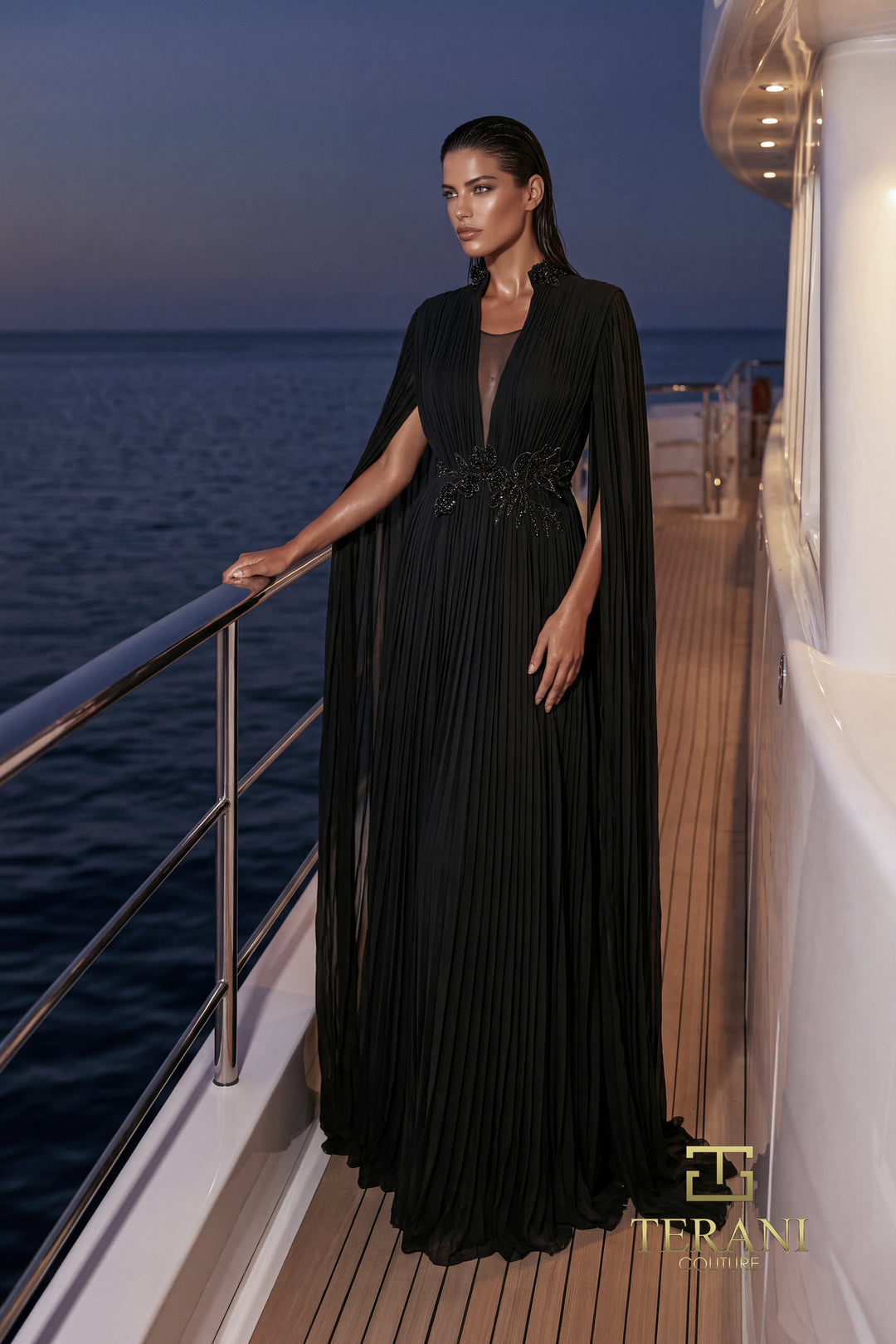 Terani 271E7510 high neck plunge cape sleeve pleated A-line evening gown front view